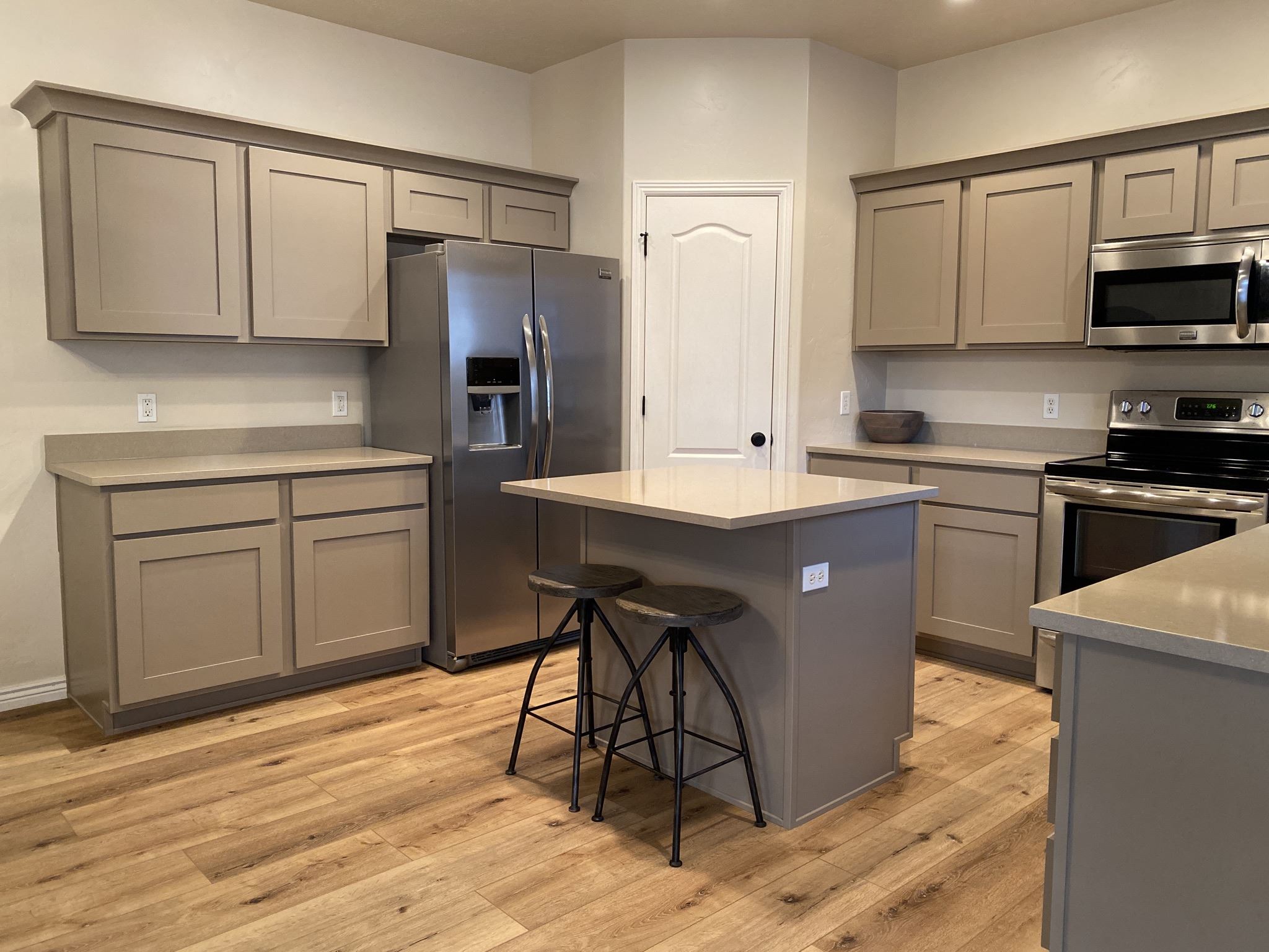 Gray cabinets and a wood-look kitchen floor