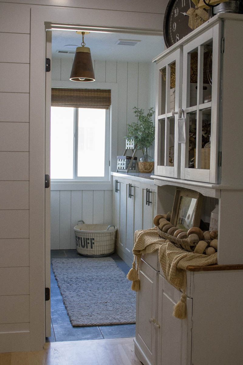 Painted room with built-in cabinetry and window