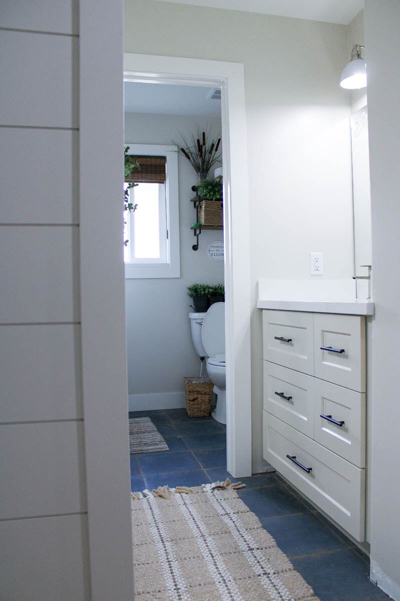 White built-in cabinet doors beside a hallway