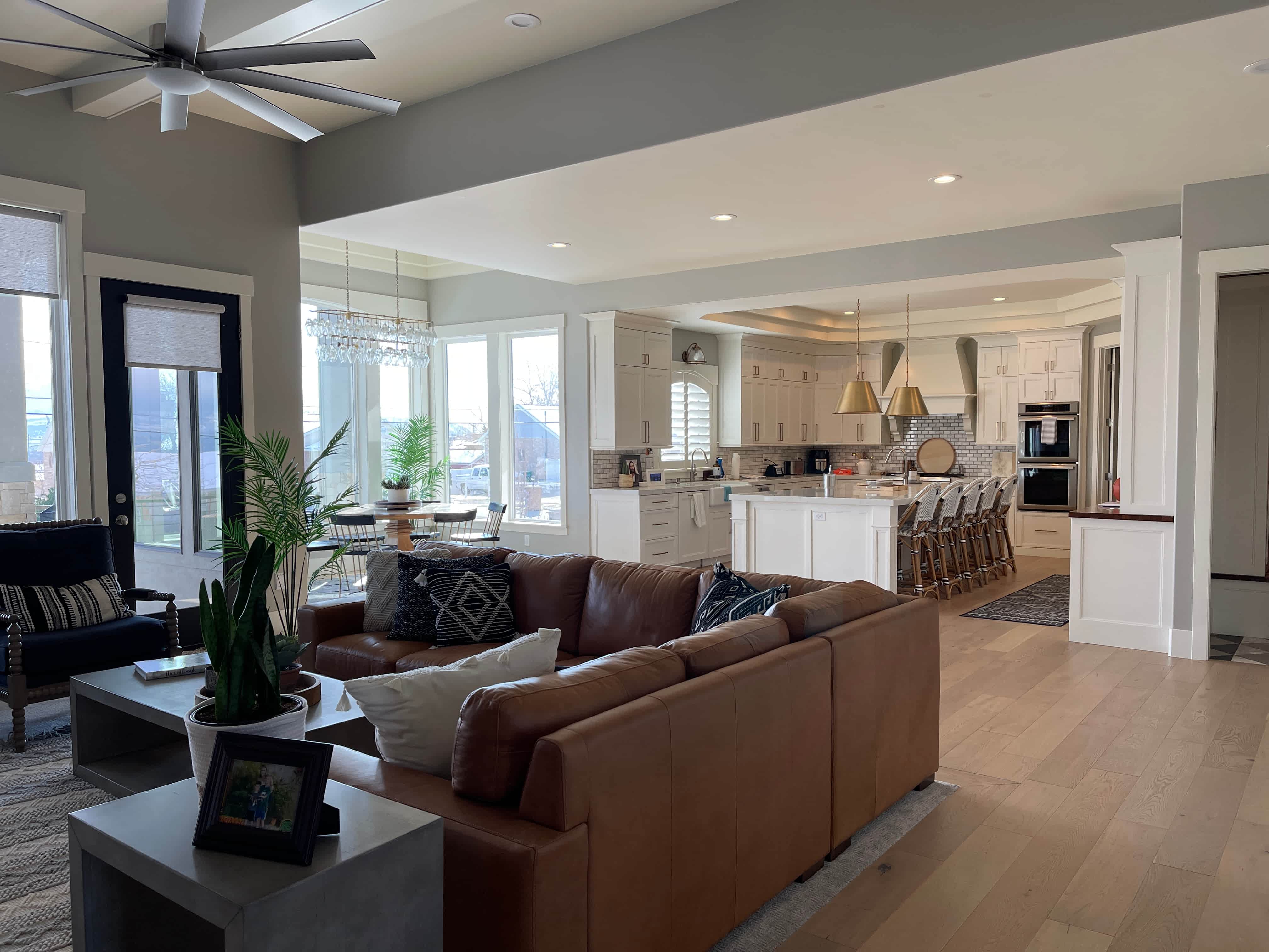 Open living room and kitchen with painted cabinetry